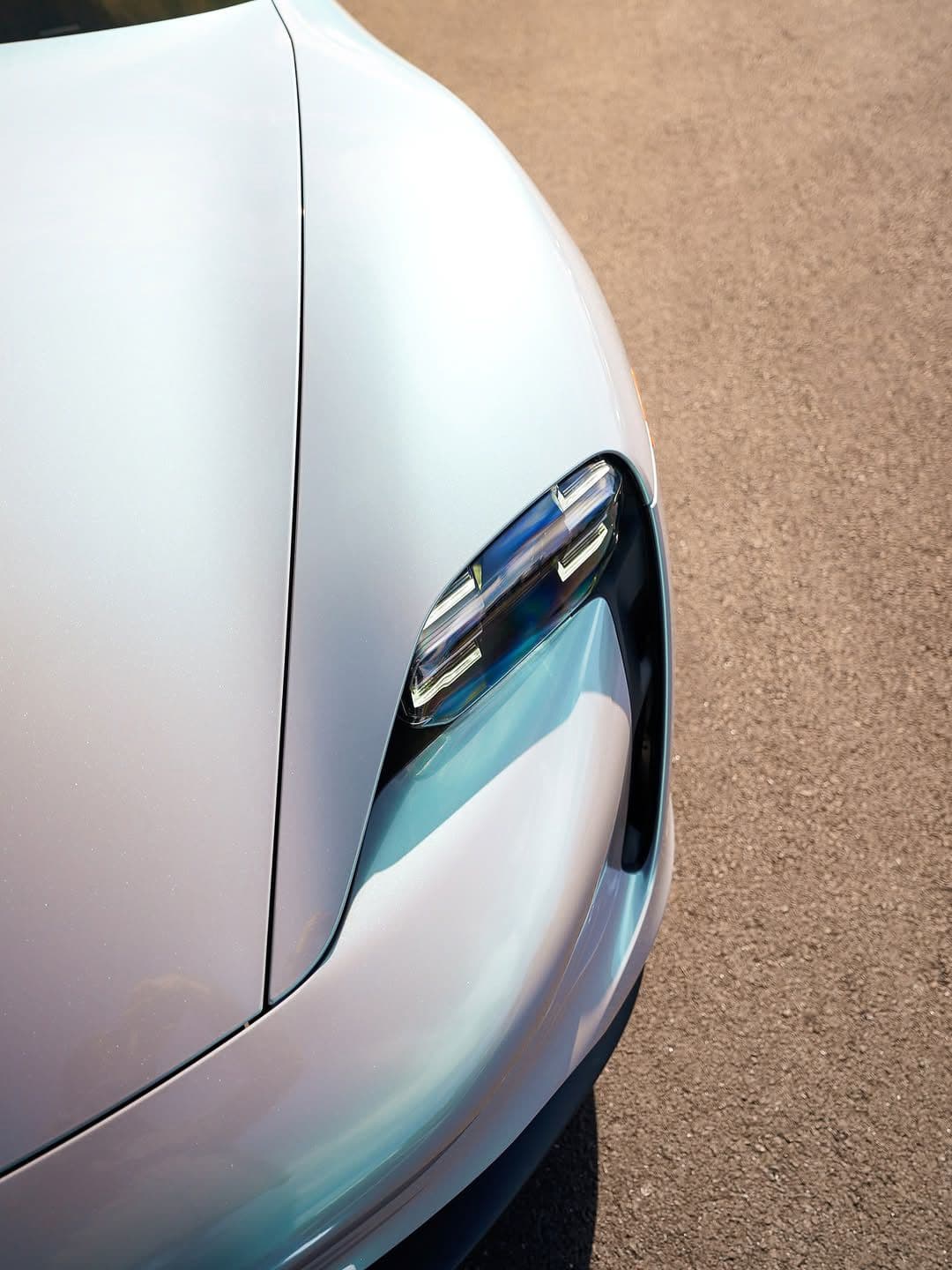 Magic Gray Green on Porsche Taycan, Detail Driven