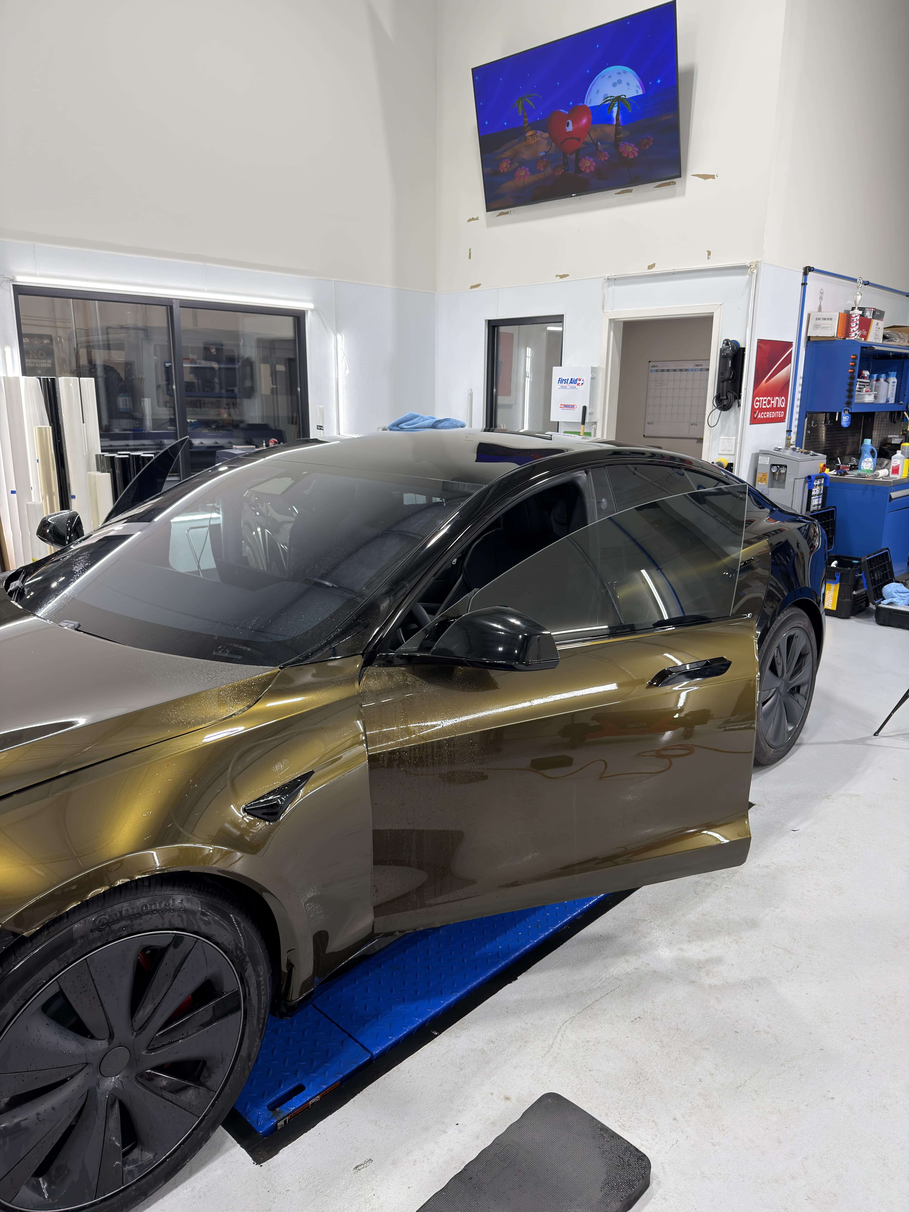 Liquid Tungsten Black Gold Color PPF on Tesla Model S at Essential Auto Styling, hero shot
